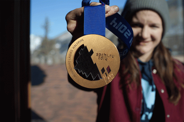 Kelly Clark, showing off her newest hardware: a bronze medal | P: Susie Floros